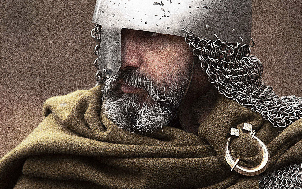 Viking i hjelm og ringbrynje med grøn kappe